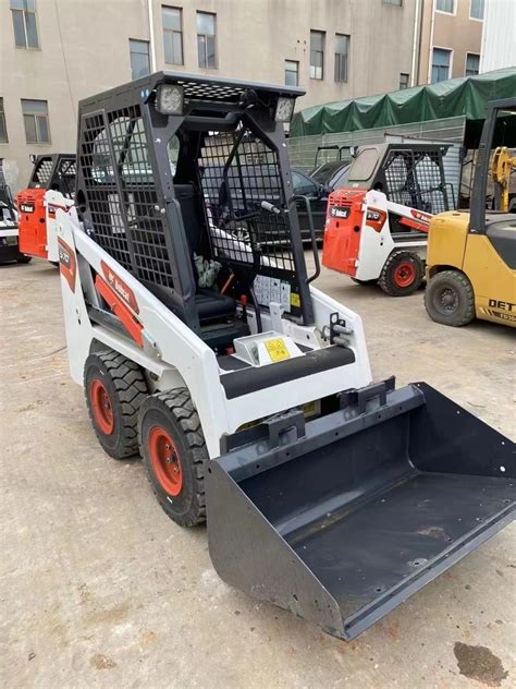 bobcat smallest skid steer|small skid steer with tracks.